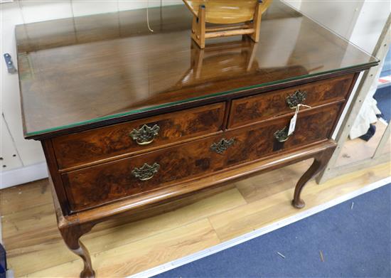 An 18th century walnut chest on later stand, W.105cm H.76cm